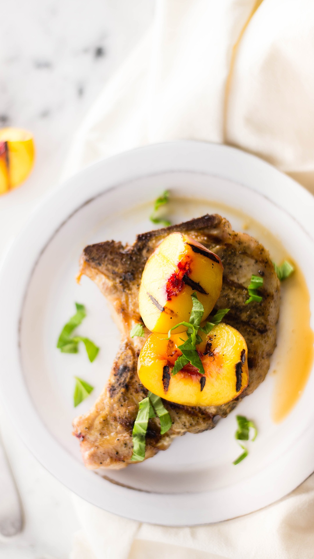 Grilled Pork Chops With Spicy Grilled Peaches | Tastemade