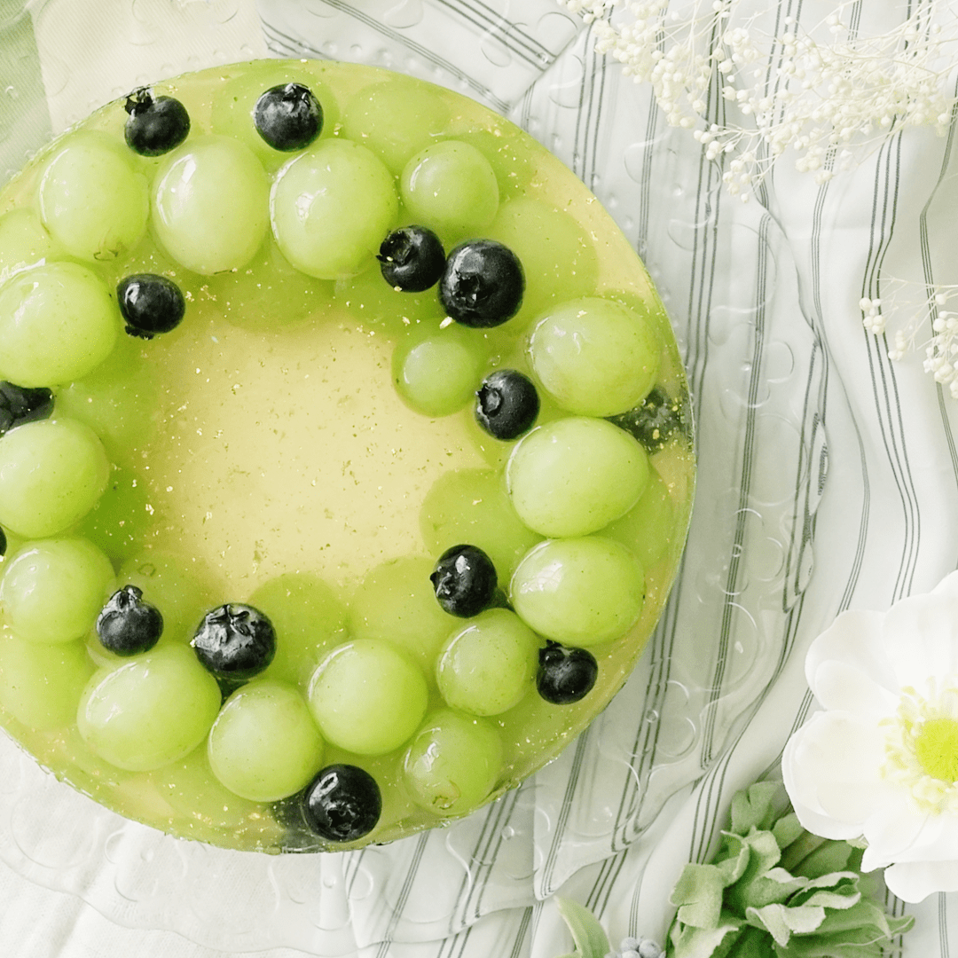 Nice sponge happy birthday cake with mascarpone and grapes on the cake  stand with candles on festive..., Stock Photo, Picture And Low Budget  Royalty Free Image. Pic. ESY-034092016 | agefotostock