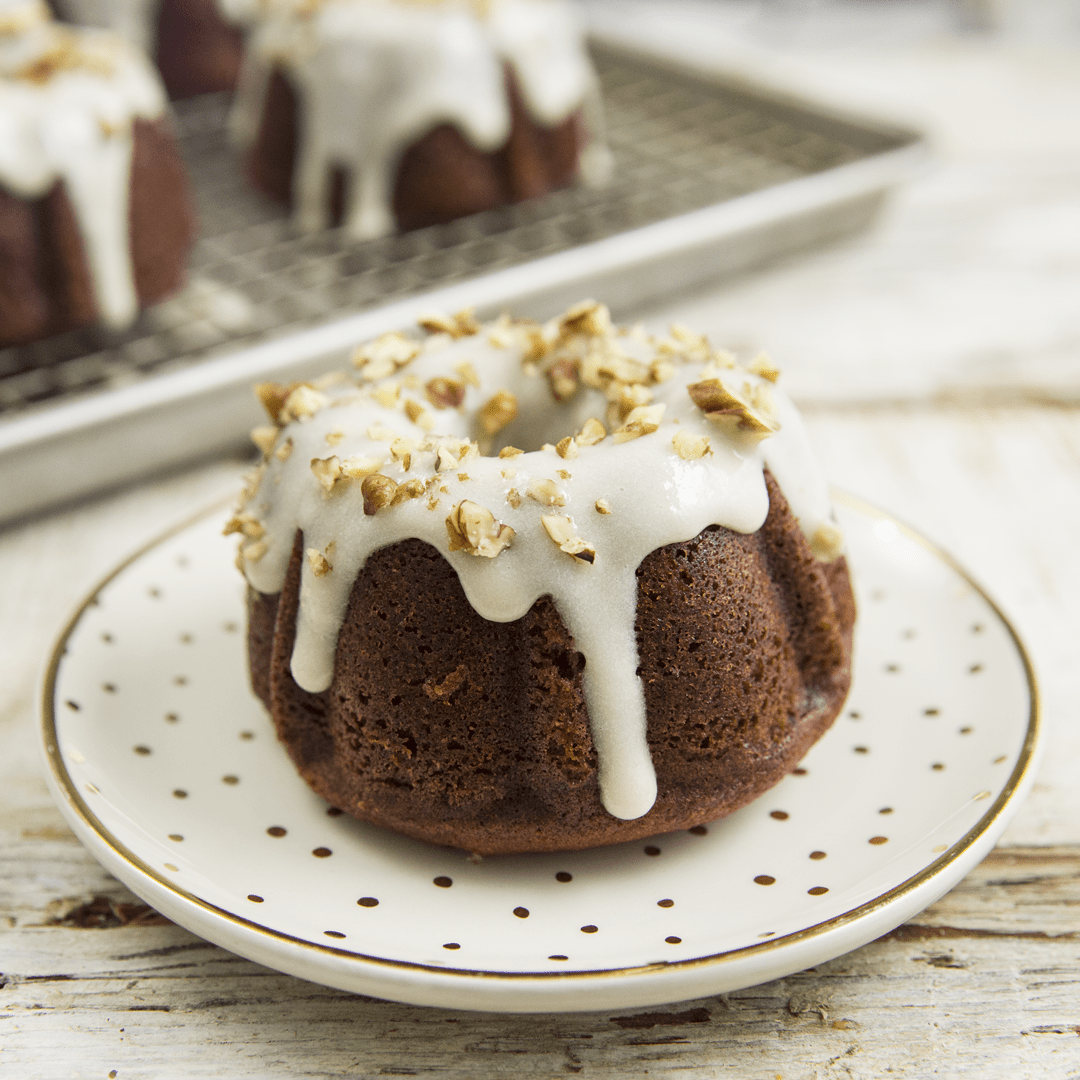 Mini Chocolate Bundt Cake with Cream Cheese Frosting - Glitter and