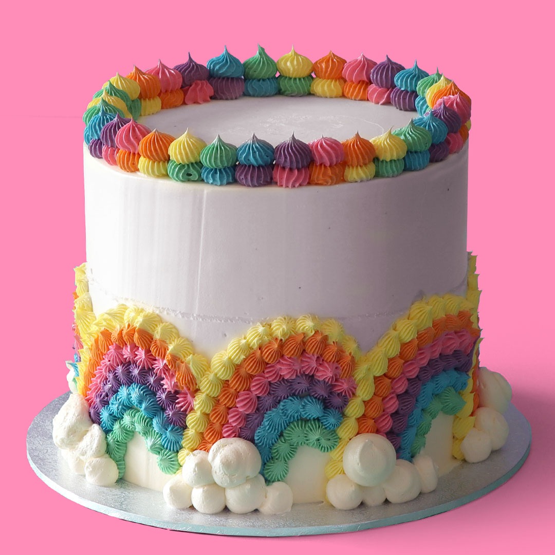 How to Make a Rainbow Surprise Layered Cake - XO, Katie Rosario