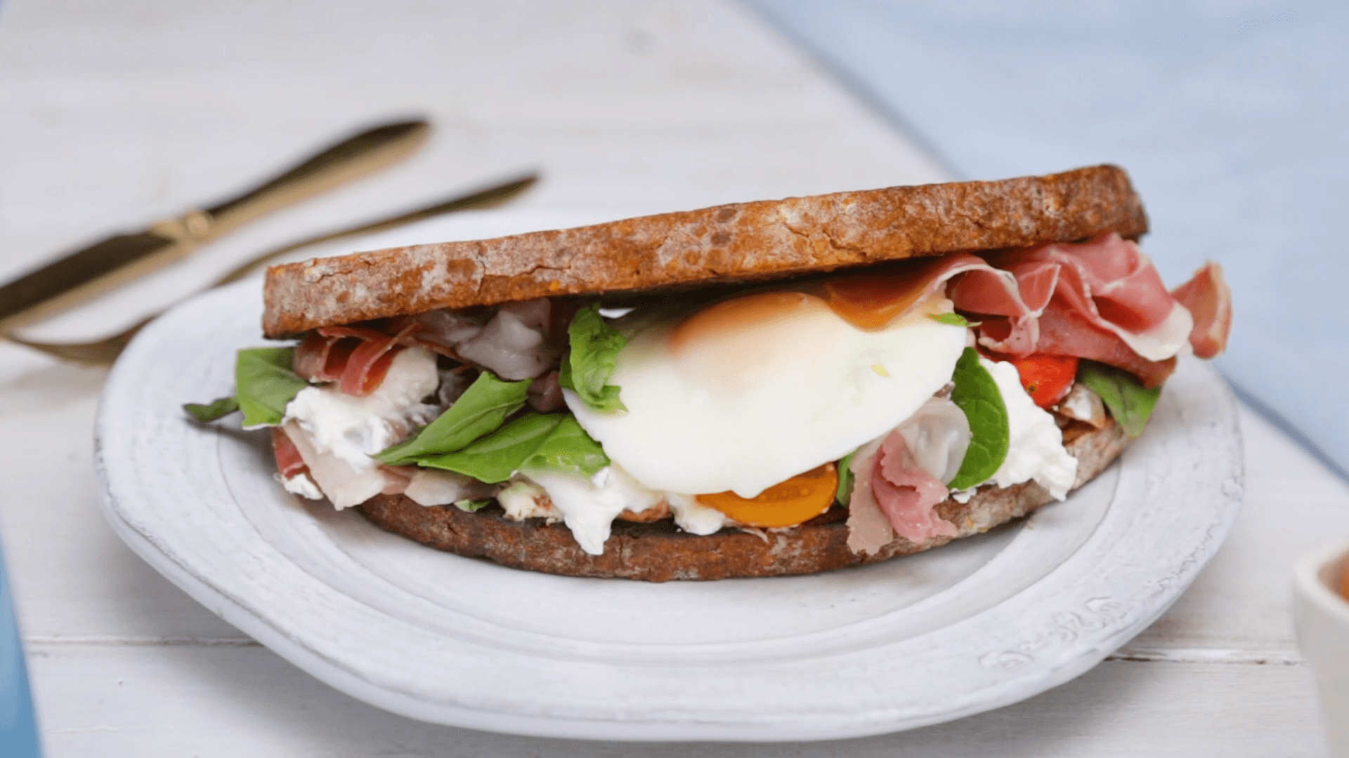Crispy Prosciutto, Burrata, Tomato and Basil Breakfast Sandwich Tastemade